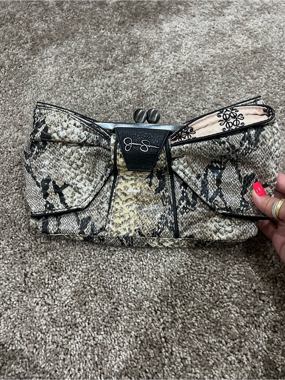 Jessica Simpson Snake-Print Bow Clutch in Neutral Tones